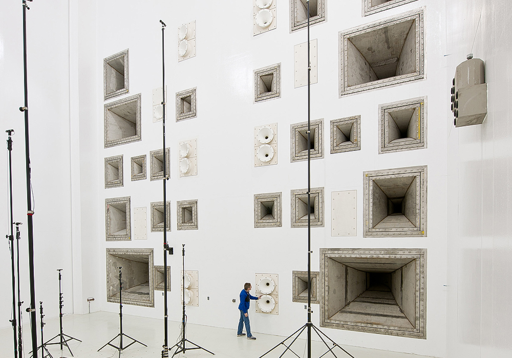 Man inspecting acoustic equipment in The Reverberant Acoustic Test Facility (RATF) at NASA’s Plum Brook Station – the largest acoustic test facility in the world